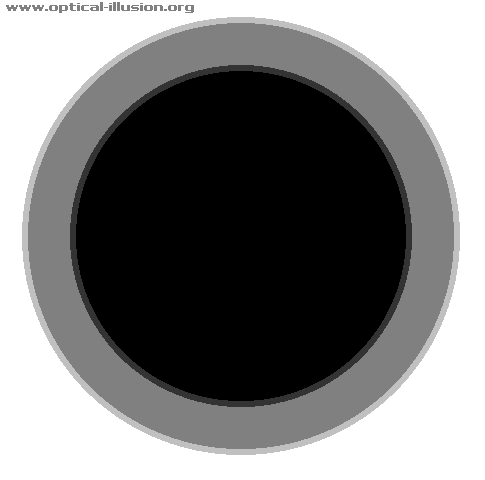 Focus in the middle of the black circle. It gets bigger.