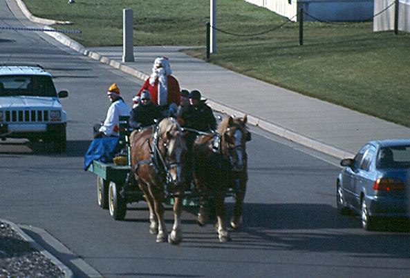 Papa Noel tirado por caballos